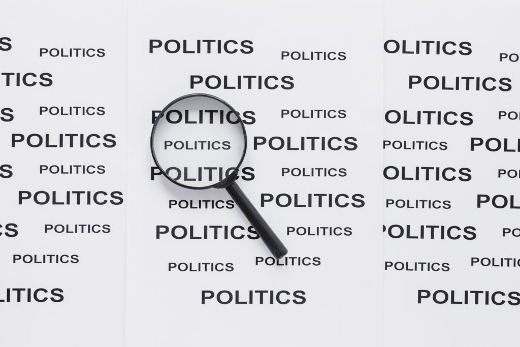 top view magnifying glass with politics